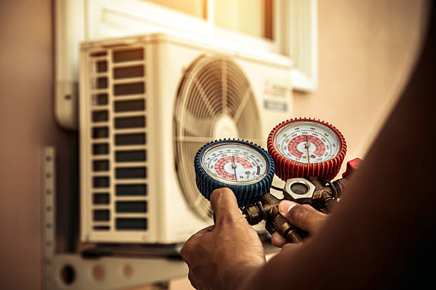Professional Ac Installation technician working in Lohman, MO